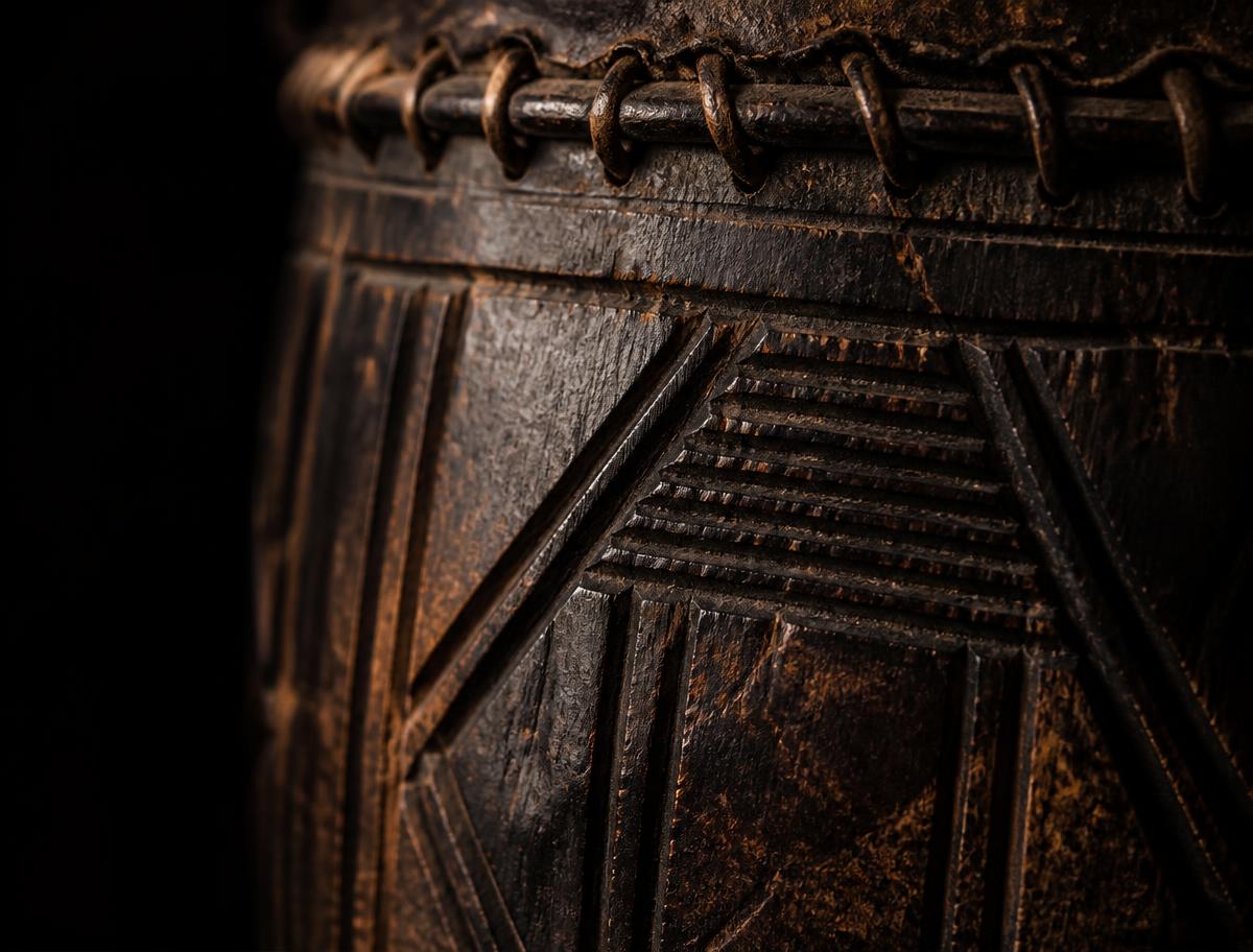 Carved detail of a traditional hand-made drum